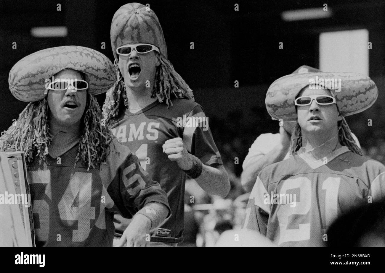 The coneheads are given a run for the money by these three Ram fans