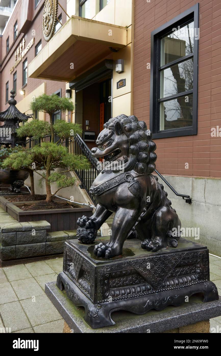 Chinese style Buddhist guardian lion metal sculpture outside Gold Buddha Monastery, Vancouver, British Columbia, Canada Stock Photo