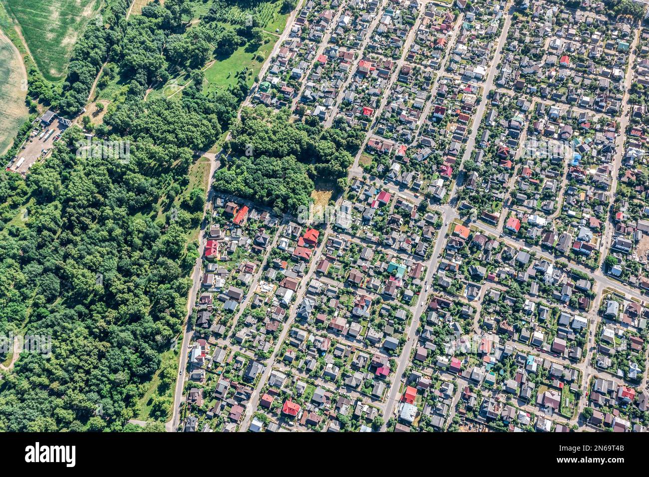 aerial view of residential neighborhood in the suburbs during sunny summer day Stock Photo