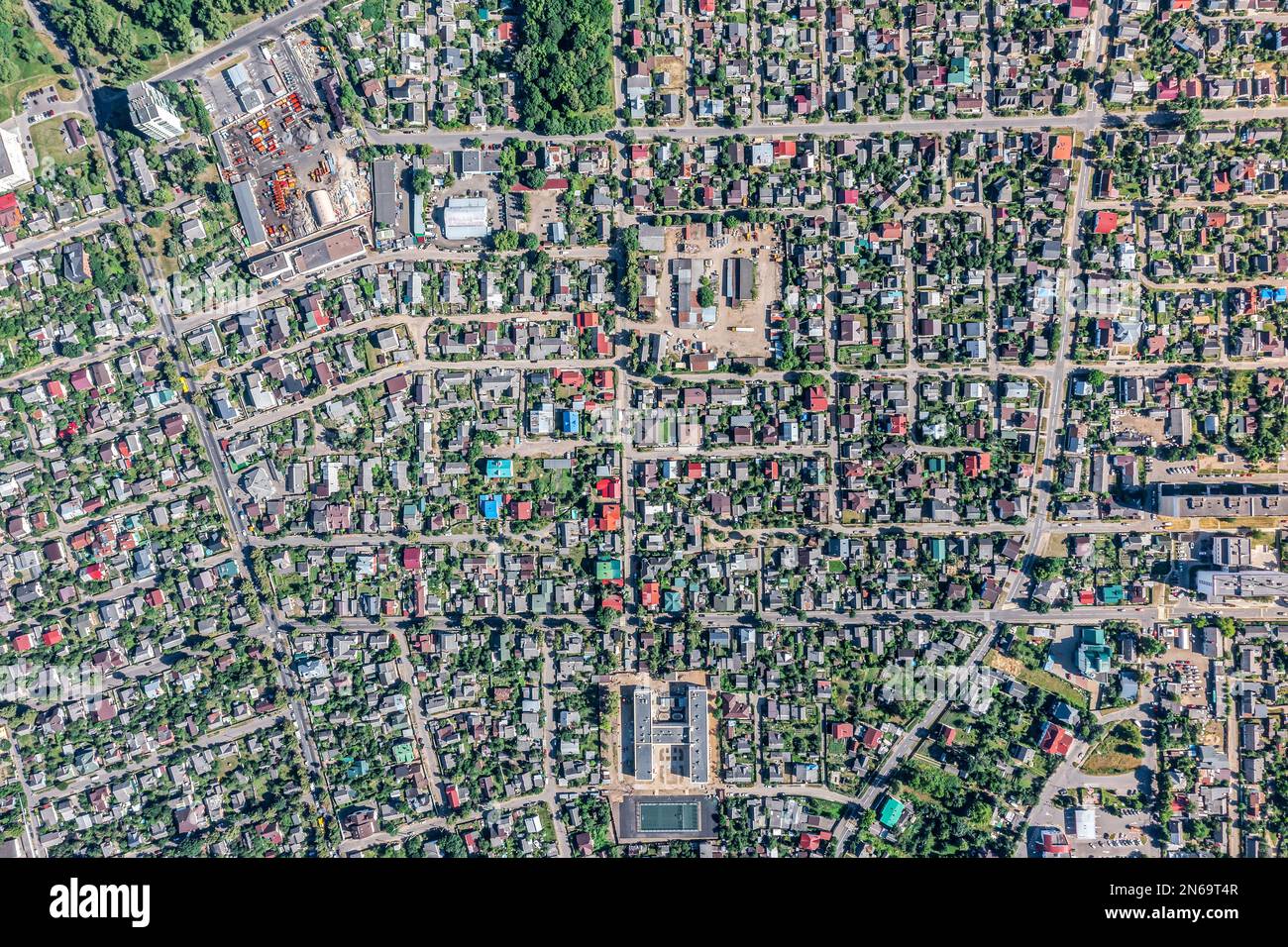 aerial view of big suburban neighborhood in a sunny summer day. drone photo. Stock Photo
