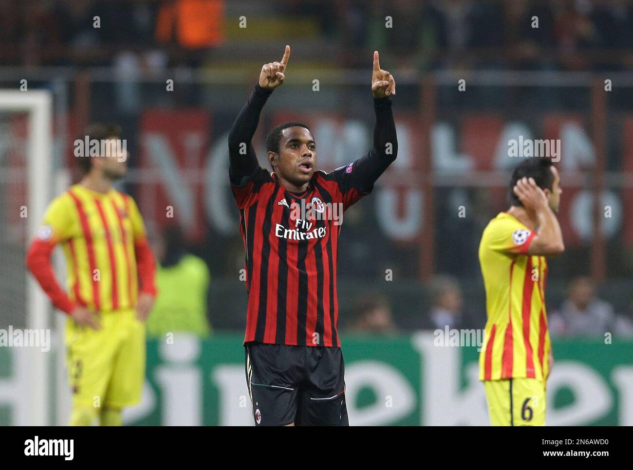 AC Milan's Robinho celebrates scoring the opening goal during a Champions  League, Group H, soccer match between AC Milan and Barcelona at the San  Siro stadium, in Milan, Italy, Tuesday, Oct. 22,, image size:1300x966