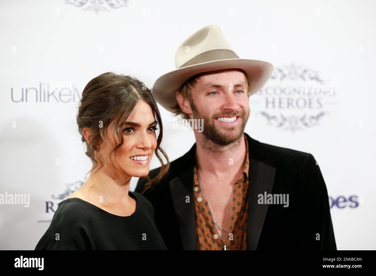 Actress Nikki Reed, left, and husband musician Paul McDonald, right ...