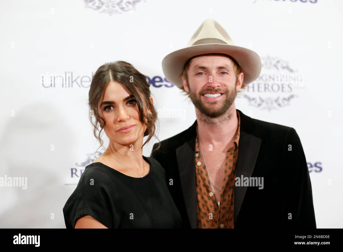 Actress Nikki Reed, left, and husband musician Paul McDonald, right ...
