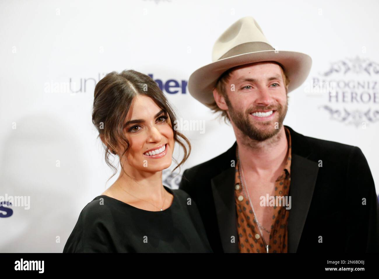Actress Nikki Reed, left, and husband musician Paul McDonald, right ...