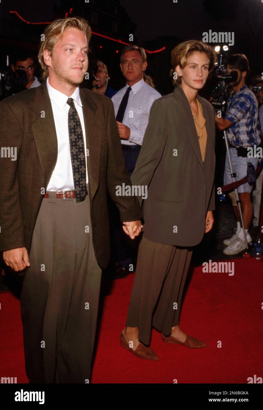 Julia Roberts  and Kiefer Sutherland at the Young Guns II Premiere at Mann's Chinese Theater in Hollywood, California July 30, 1990 Credit: Ralph Dominguez/MediaPunch Stock Photo