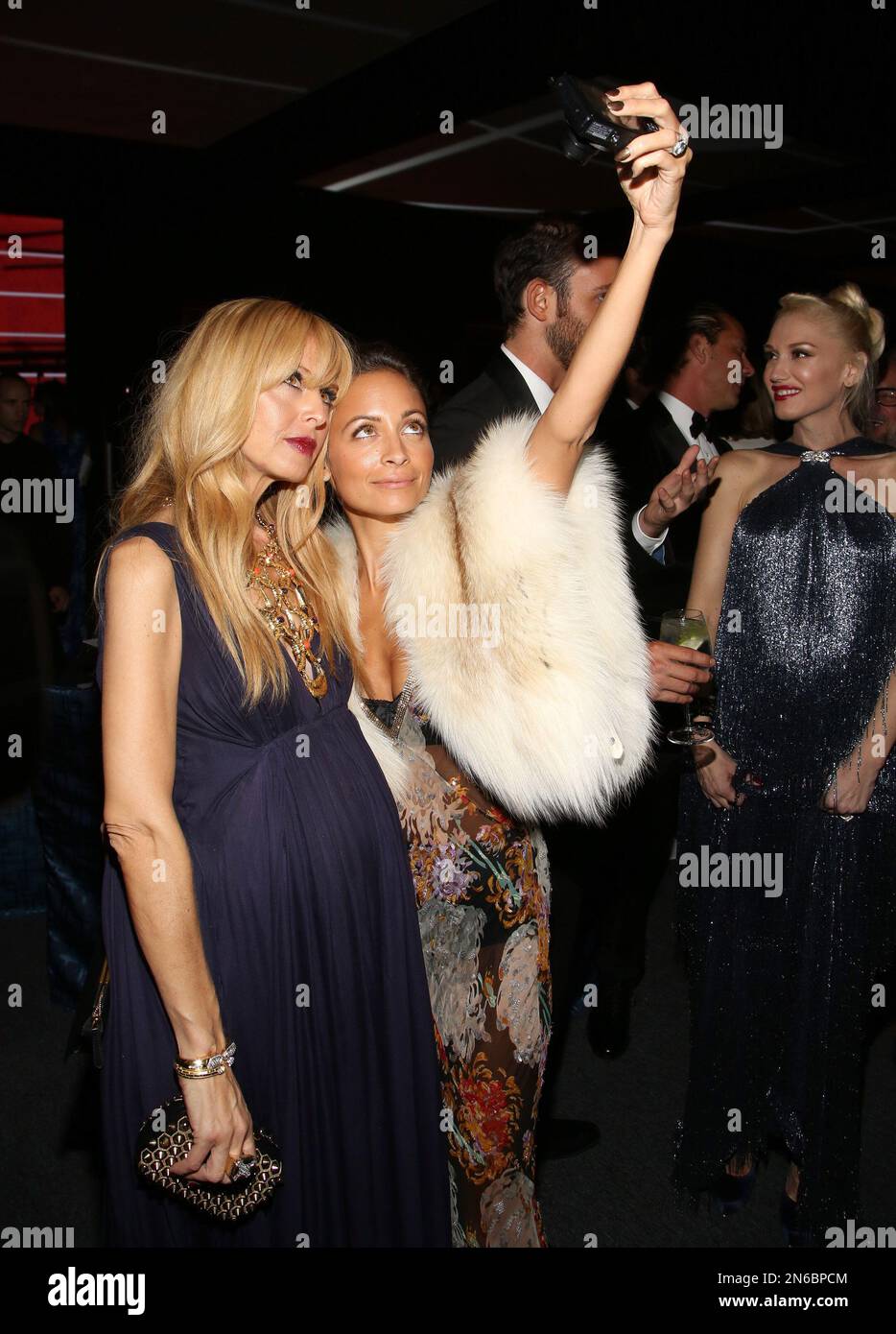 Stylist Rachel Zoe, left, and fashion designer Nicole Richie take a