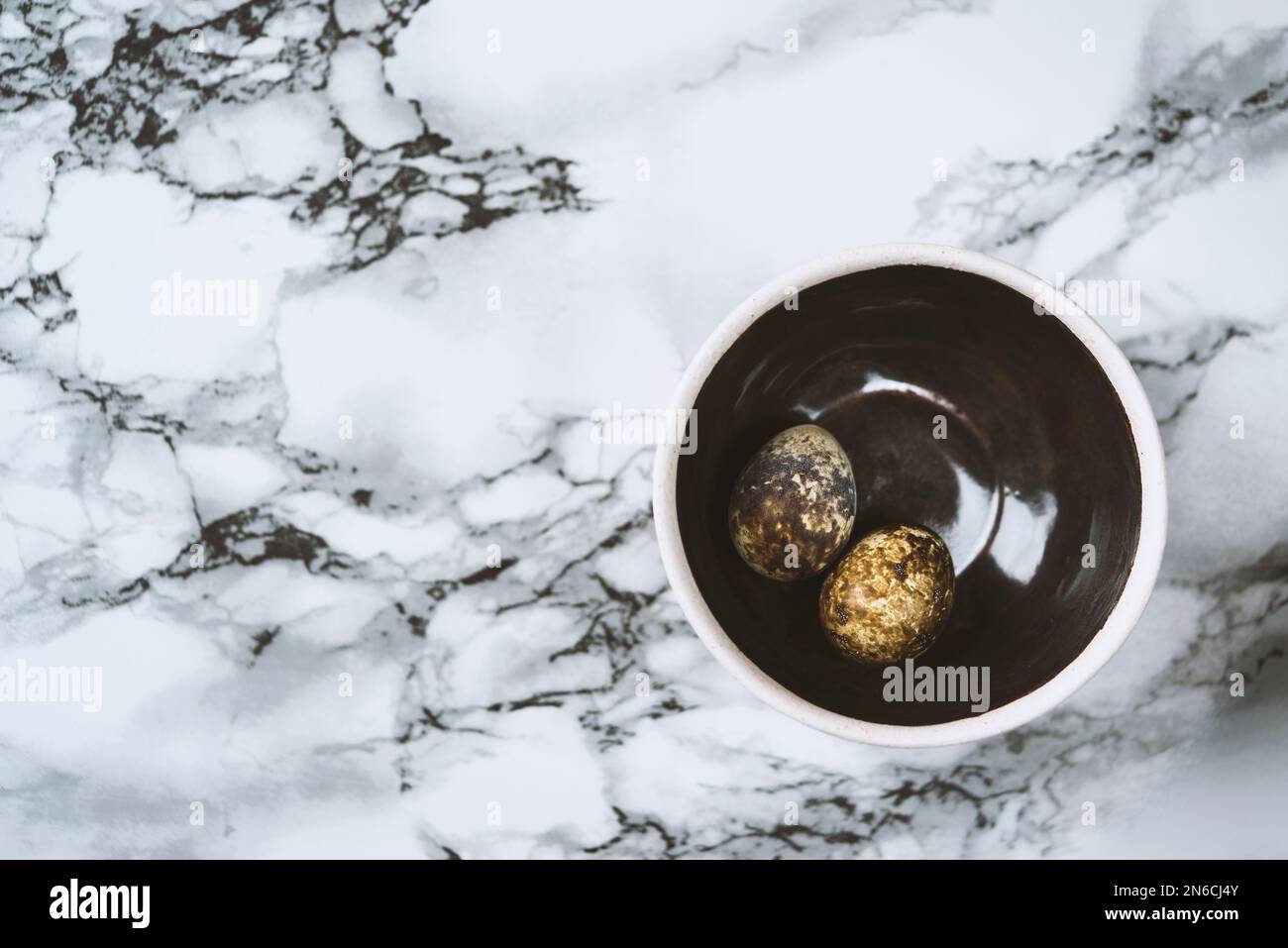 Curated visual reference: Free Range Quail Dietary Needs Reference: Fresh Organic Free Range Quail Eggs In Ceramic Bowl Top