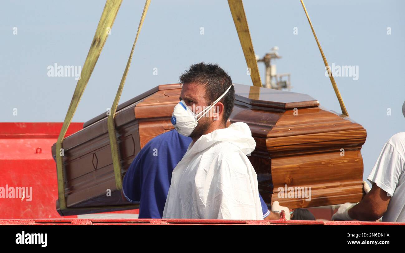The casket of one of the migrants who died when their boat capsized off in the Canal of Sicily