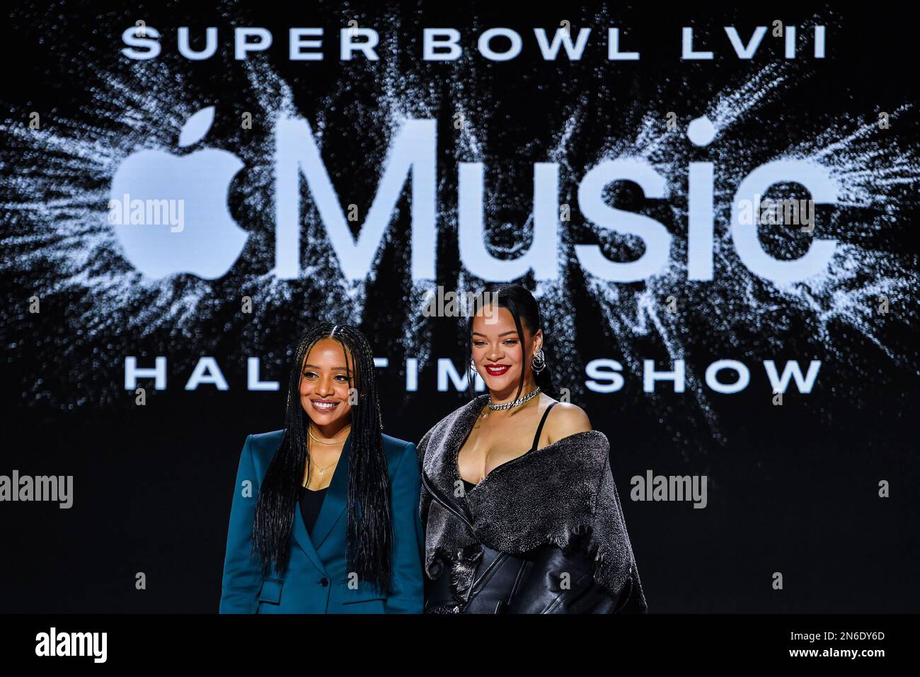 Nadeska Alexis, Apple Music host and Rihanna pose for photos