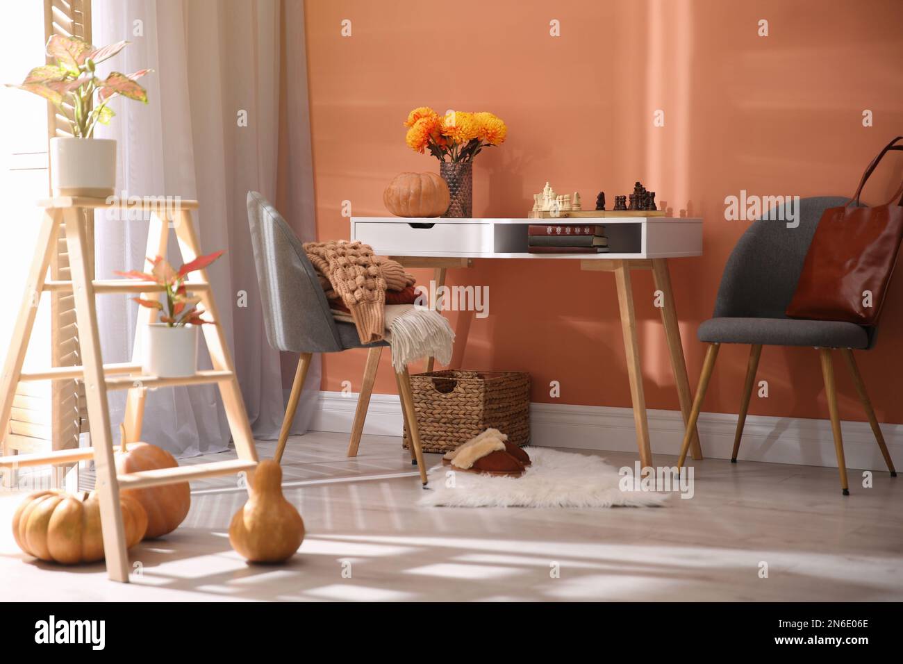 Cozy room interior inspired by autumn colors Stock Photo - Alamy