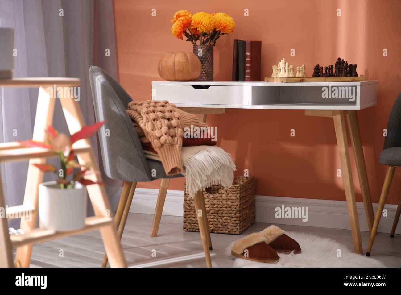 Cozy room interior inspired by autumn colors Stock Photo - Alamy