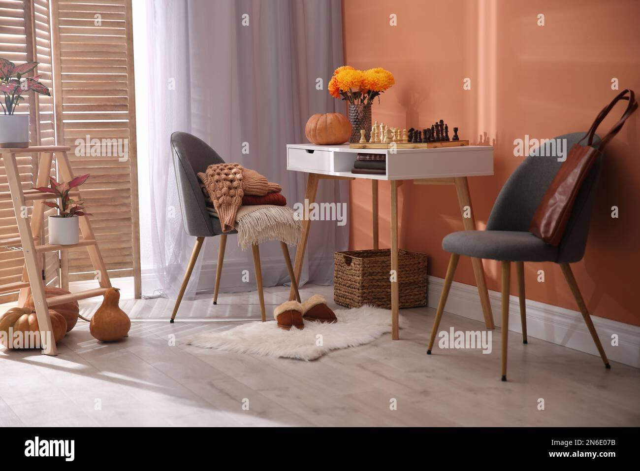 Cozy room interior inspired by autumn colors Stock Photo - Alamy