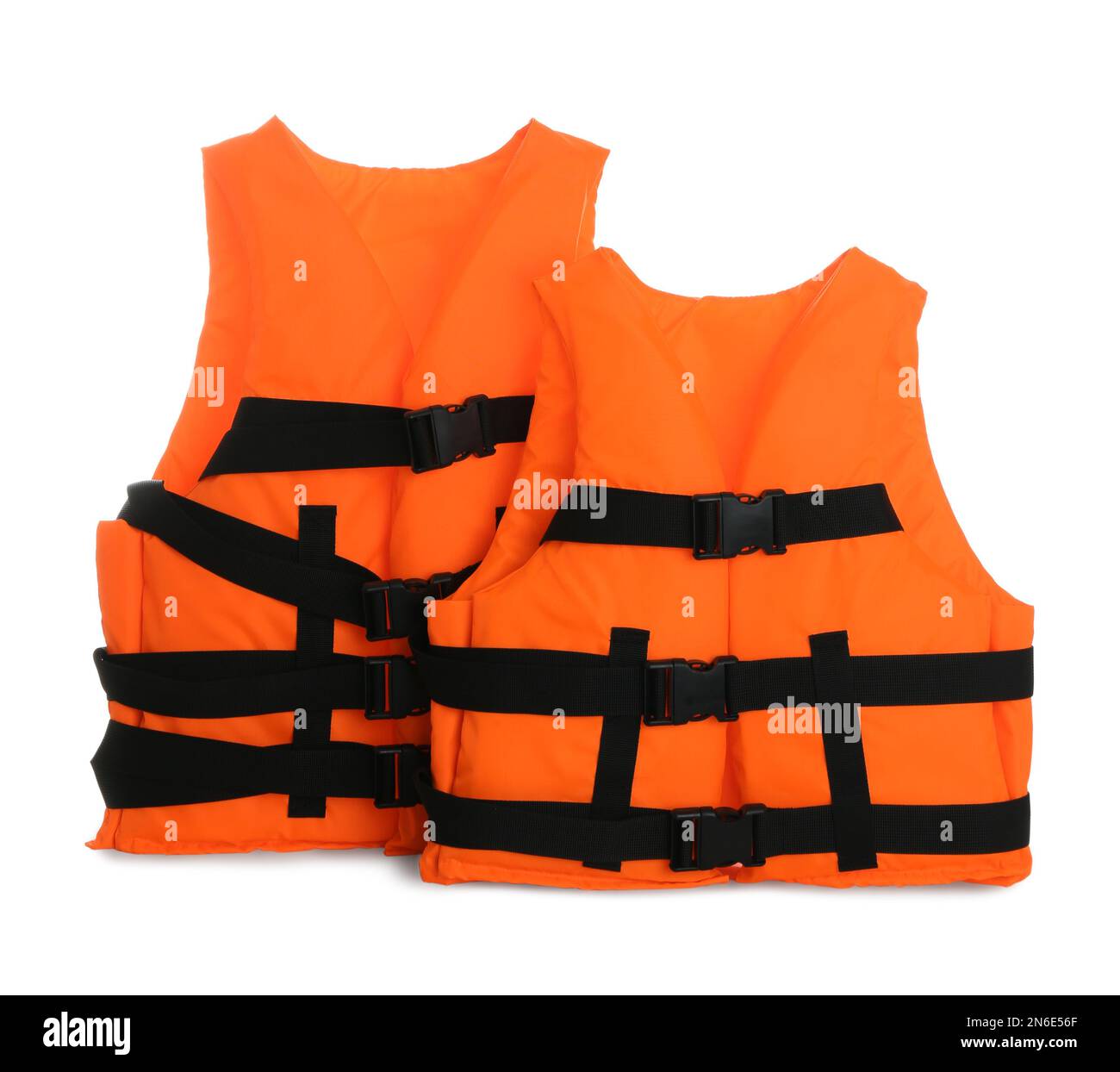 Orange life jackets isolated on white. Personal flotation device Stock Photo