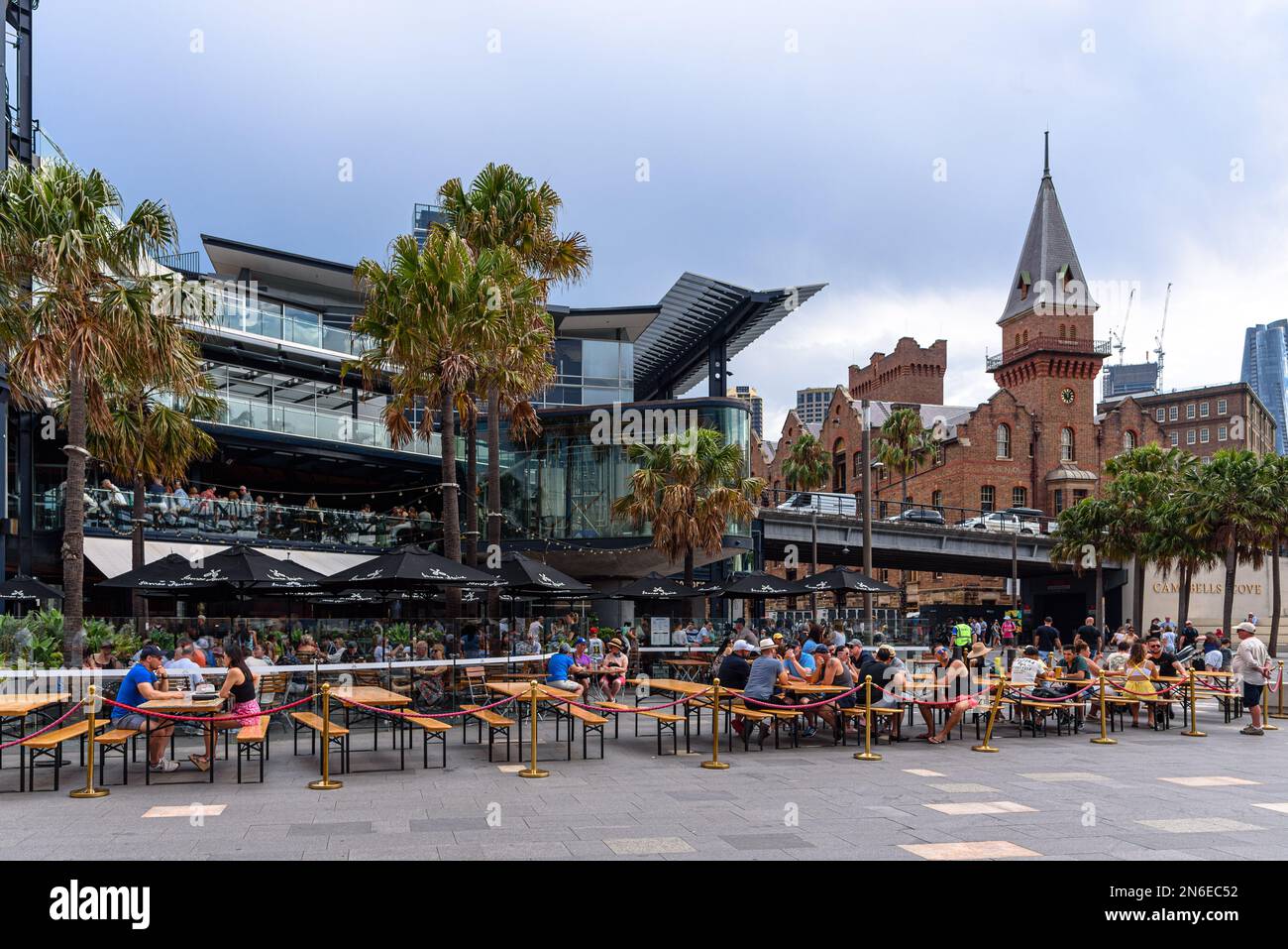 People sitting outside the Squires Landing Brewhouse at Circular Quay in Sydney, Australia Stock Photo