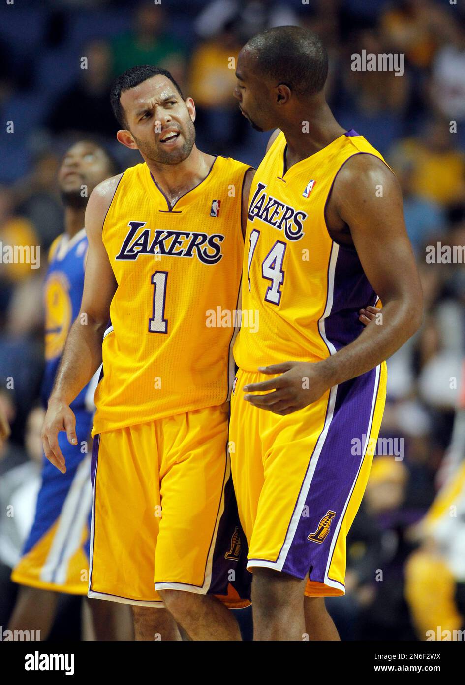 Los Angeles Lakers forward Marcus Landry right congratulates