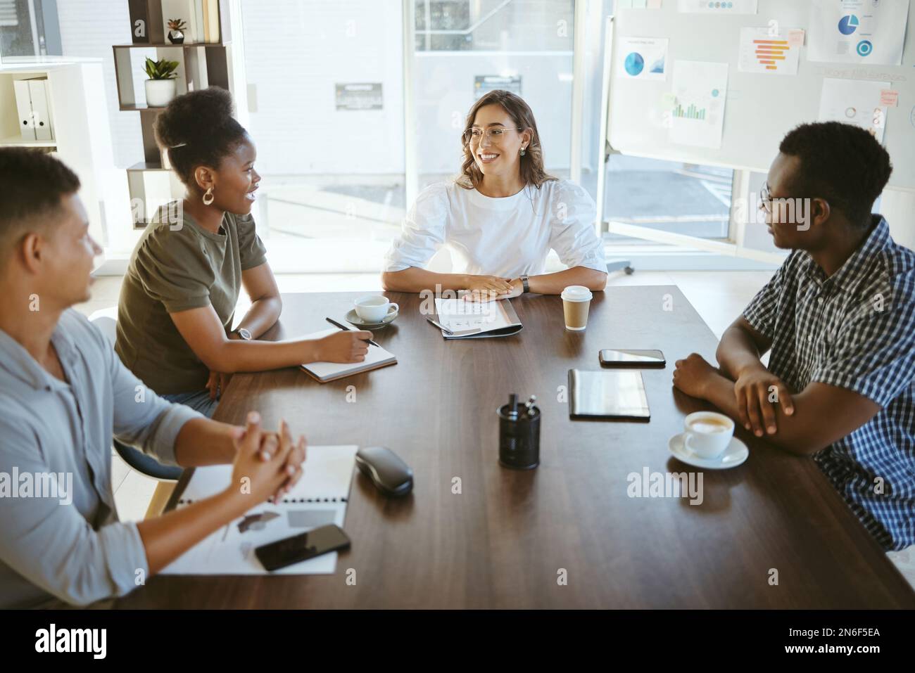Group of diverse businesspeople having a meeting in an office at work ...