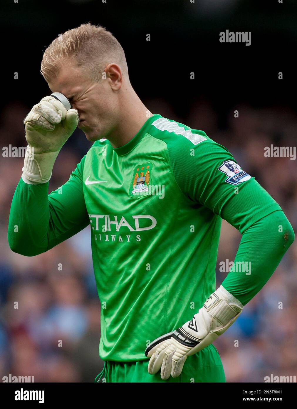 Manchester City's goalkeeper Joe Hart reacts after a goal by teammate