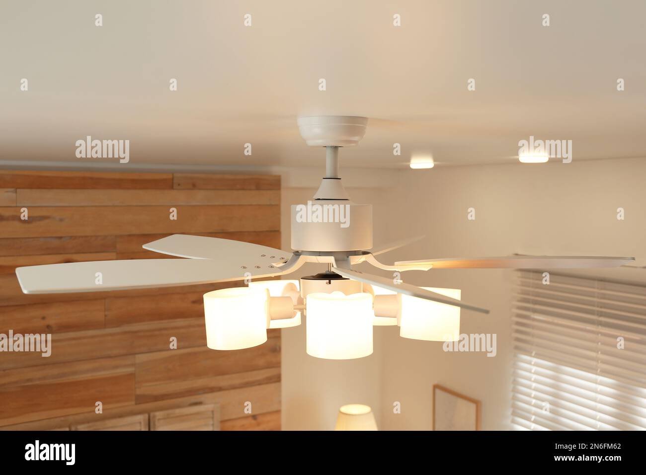 Photo inspiration: Visual Reference: Modern Ceiling Fan With Lamps Indoors Interior Element Stock Photo