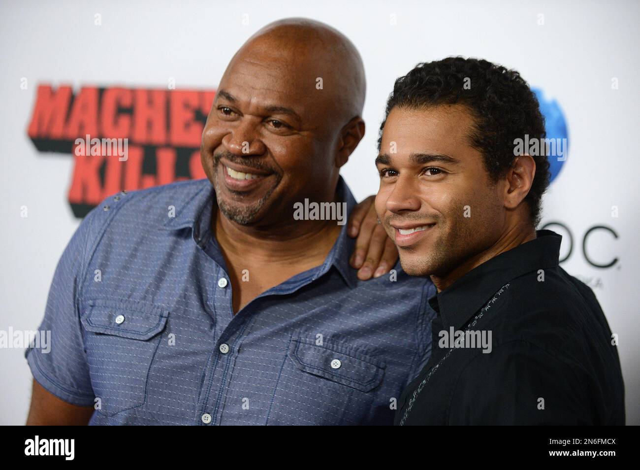 Corbin Bleu, right, and his father David Reivers arrive at the premiere