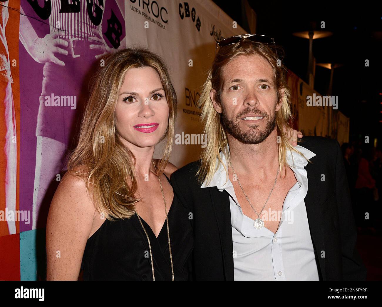 Musician Taylor Hawkins and wife Alison Hawkins arrive on the red
