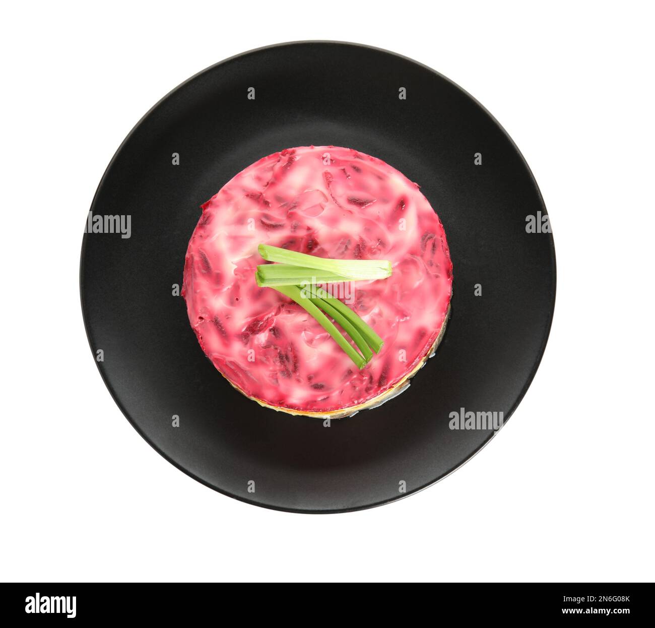 Herring under fur coat isolated on white, top view. Traditional russian salad Stock Photo Alamy