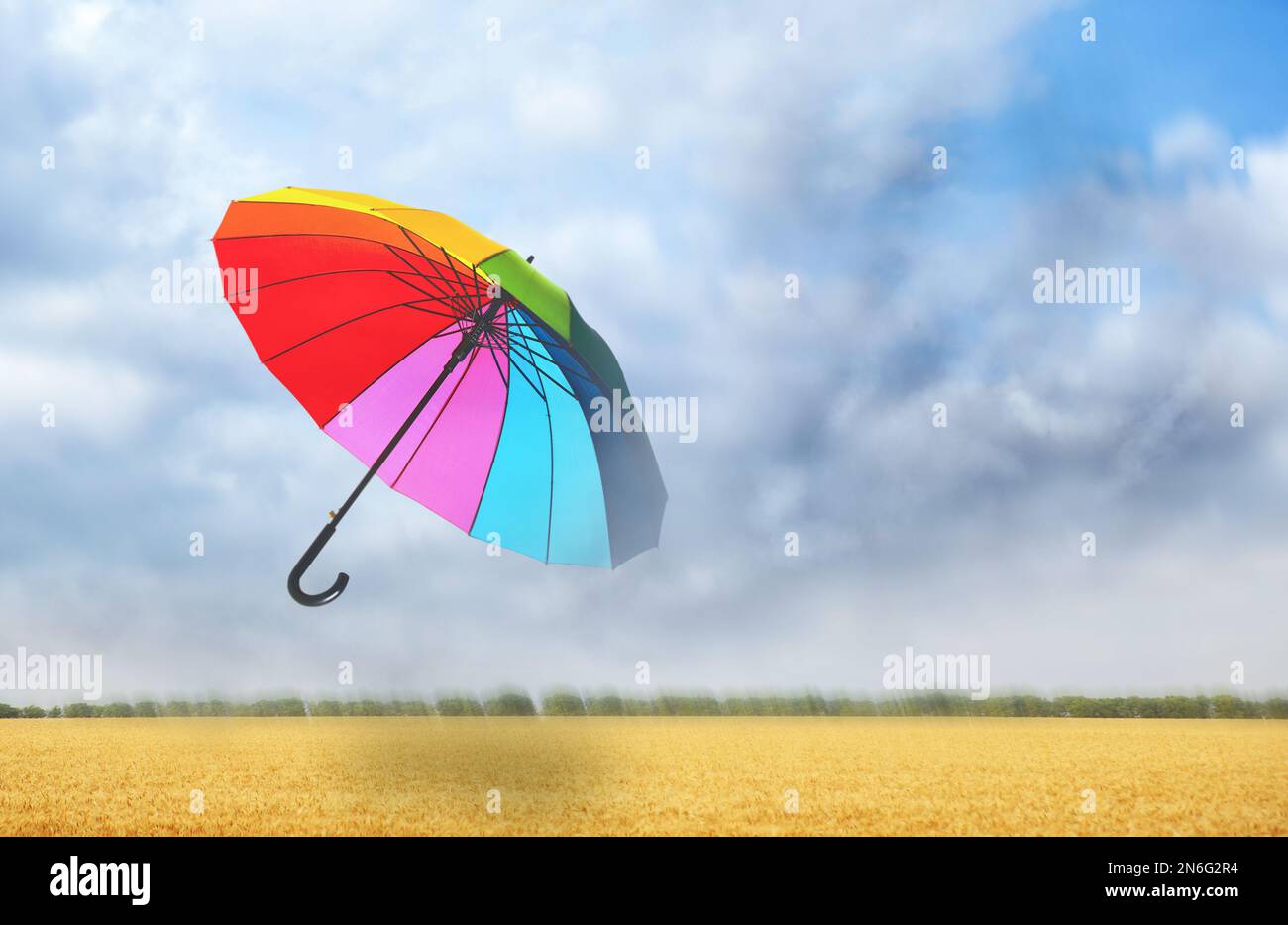 Wind blown umbrella hi-res stock photography and images - Alamy
