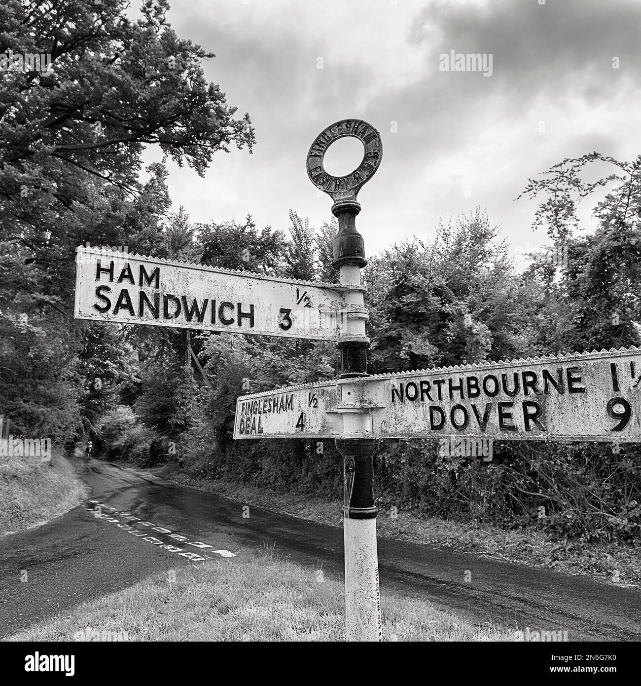 Old signs show direction and distance to Ham and Sandwich, dreary weather, Northbourne, Kent, Dover, England, United Kingdom Stock Photo