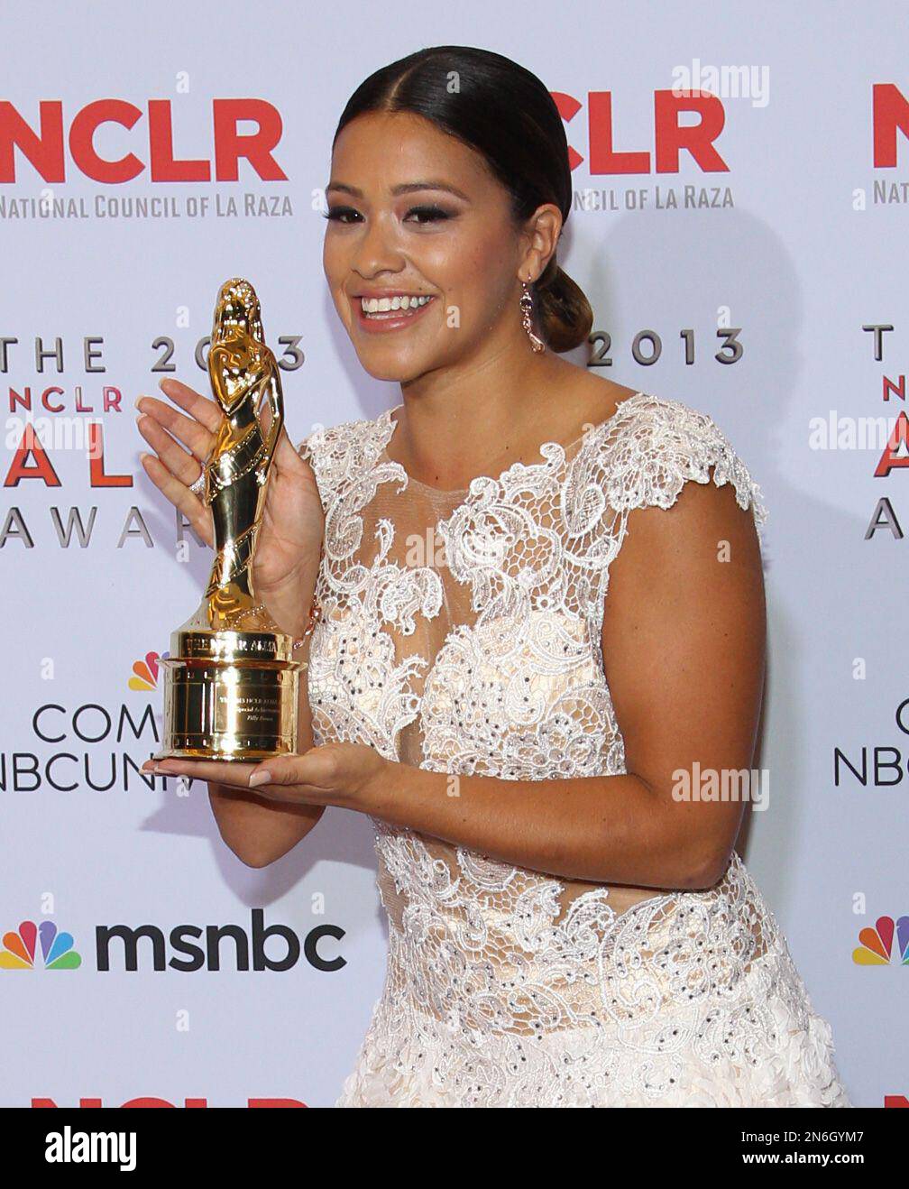 Gina Rodriguez poses backstage with the year in film award for "Filly