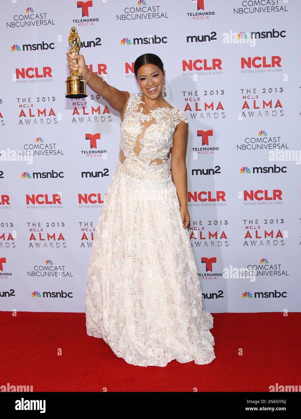 Gina Rodriguez poses backstage with the year in film award for "Filly