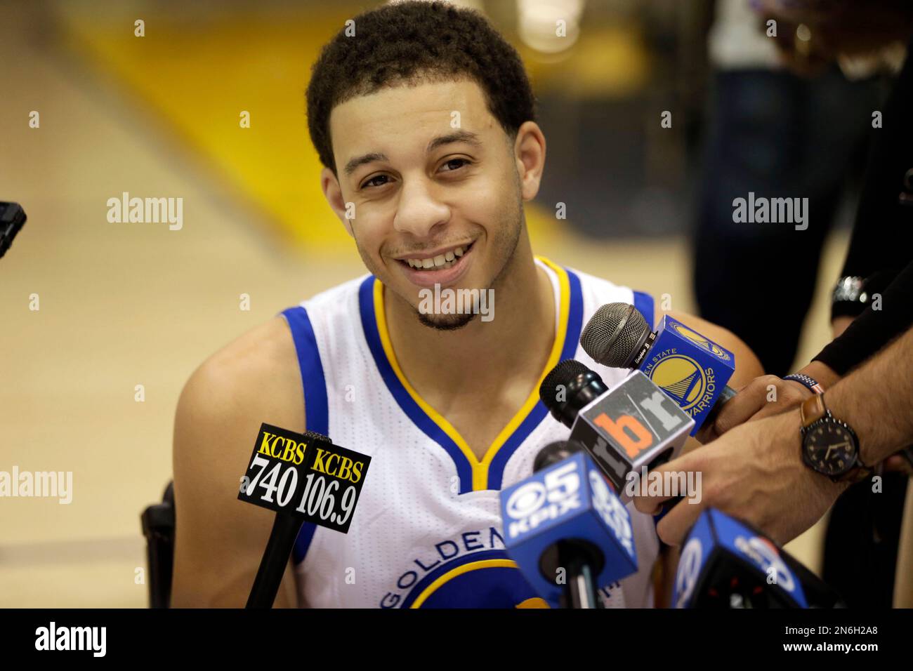 Golden State Warriors' Seth Curry smiles as he answers questions during