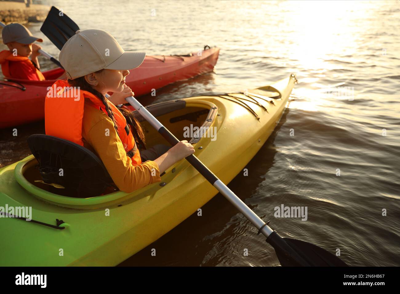 Little children kayaking on river. Summer camp activity Stock Photo - Alamy