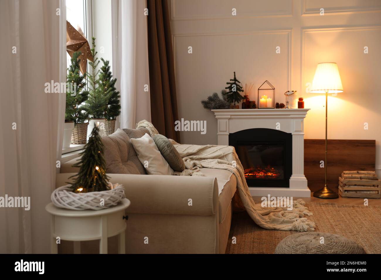 Fireplace in room with Christmas decorations. Interior design Stock ...