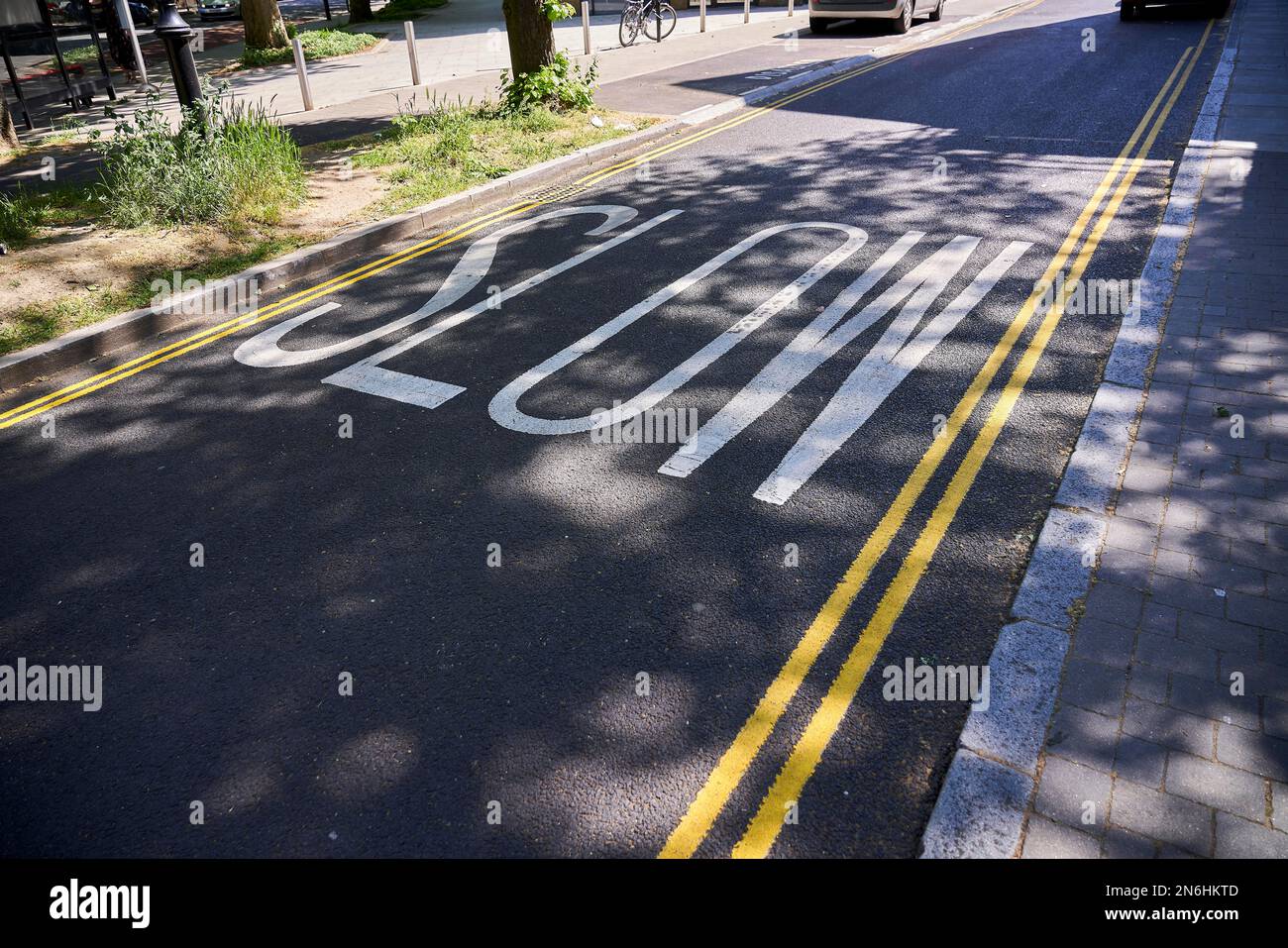 Slow lettering on traffic-calmed street, London, England, Great Britain ...