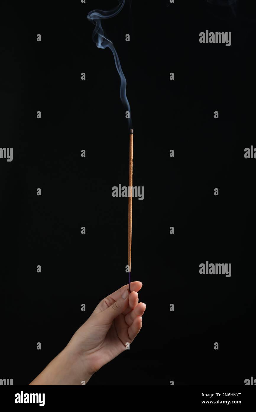 Indian woman holding incense hi-res stock photography and images - Alamy