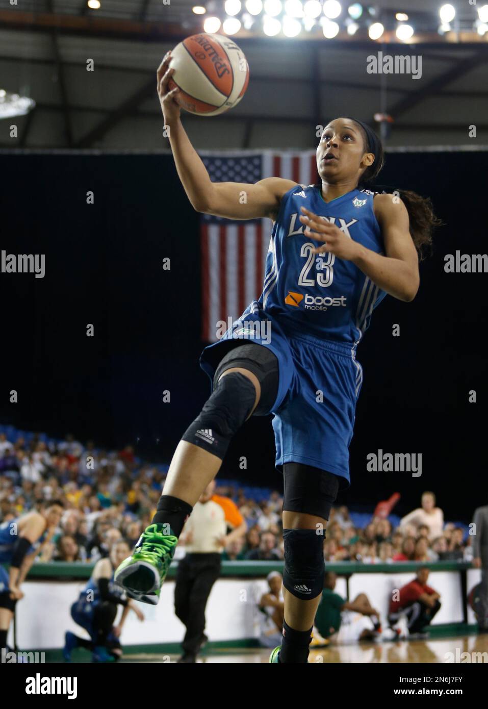 Minnesota Lynx's Maya Moore drives to the basket against the Seattle