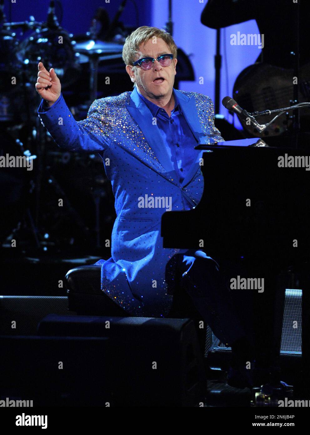 Elton John performs “Home Again” on stage at the 65th Primetime Emmy