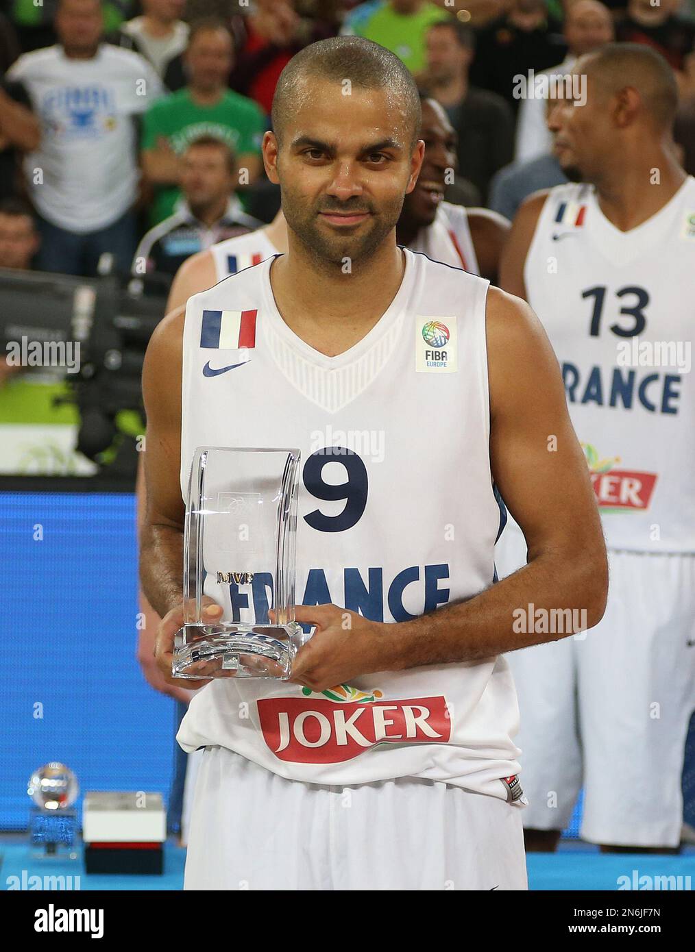 Basketball player Tony Parker poses with his girlfriend Axelle Francine as  he hosts his 8th charity gala 'Par Coeur' to benefit the association 'Make  a Wish', at the Abbaye Paul Bocuse in