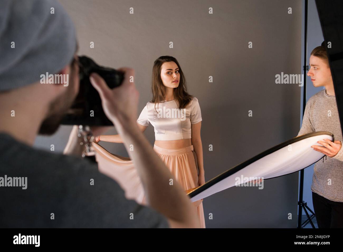 Backstage photo session posing woman hi-res stock photography and ...