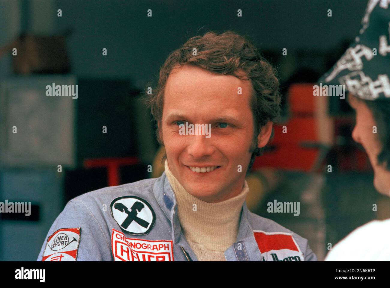 Austrian car racing driver Niki Lauda greating a woman before getting... News Ph