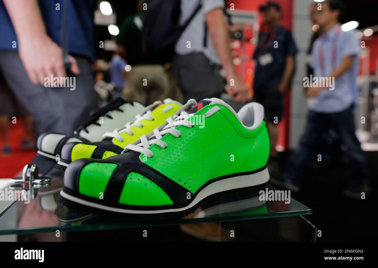 Different models of the Nalini cycling shoes sit on display at the  Interbike International Bicycle Expo, Wednesday, Sept. 18, 2013, in Las  Vegas. The exhibit floor opened Wednesday, where more than 750