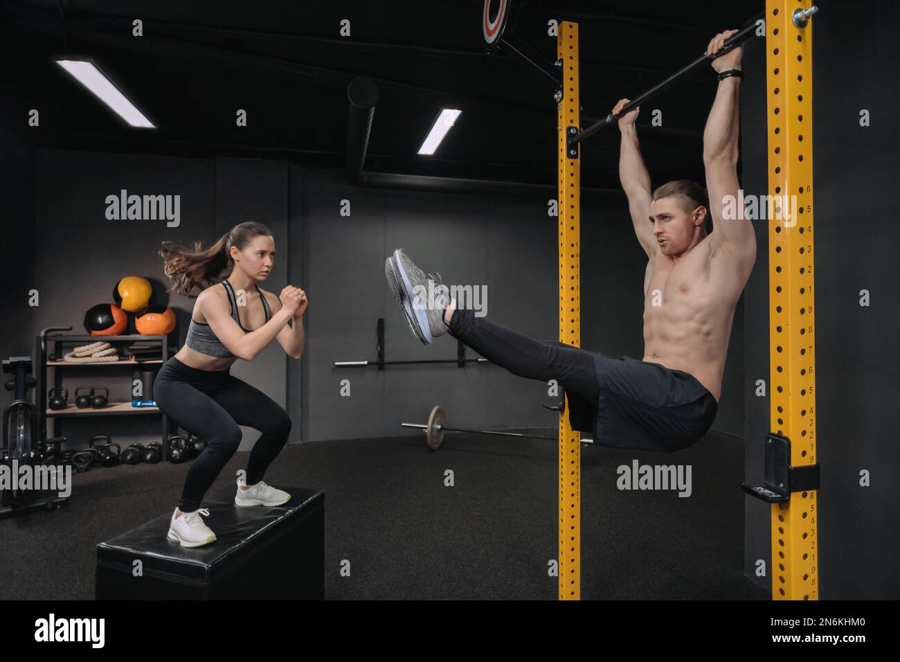 Crossfit training. Handsome shirtless muscular man doing abdominal