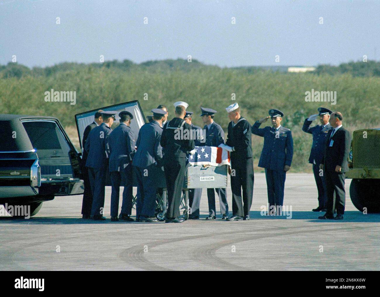 Body of astronaut Virgil Grissom being put into a hearse,1967. Grissom ...