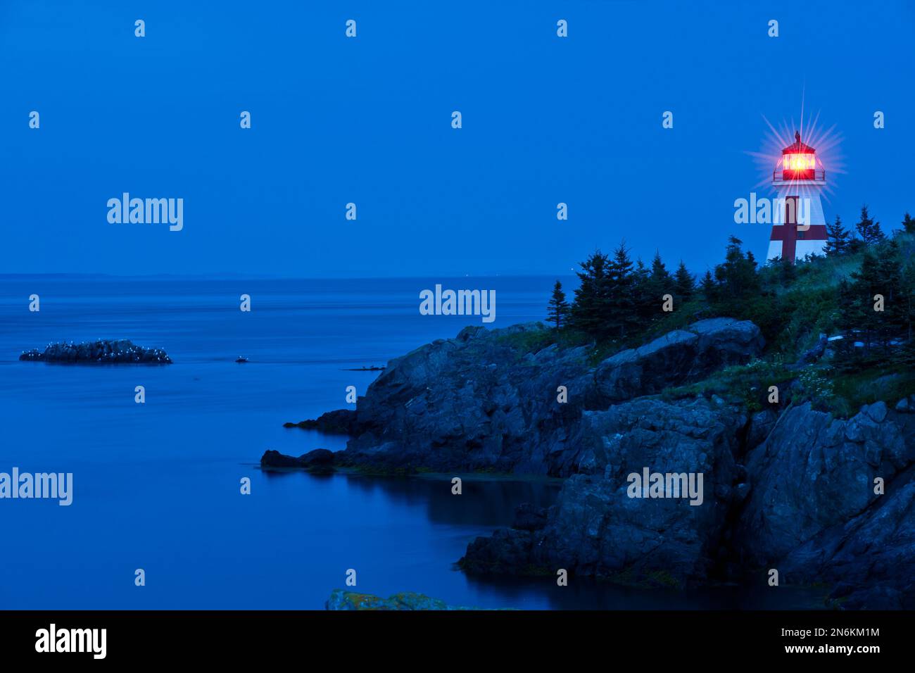 Head Harbour Light Station (East Quoddy Head Lightstation) built in 1829 at twilight, Campobello Island, Canada Stock Photo