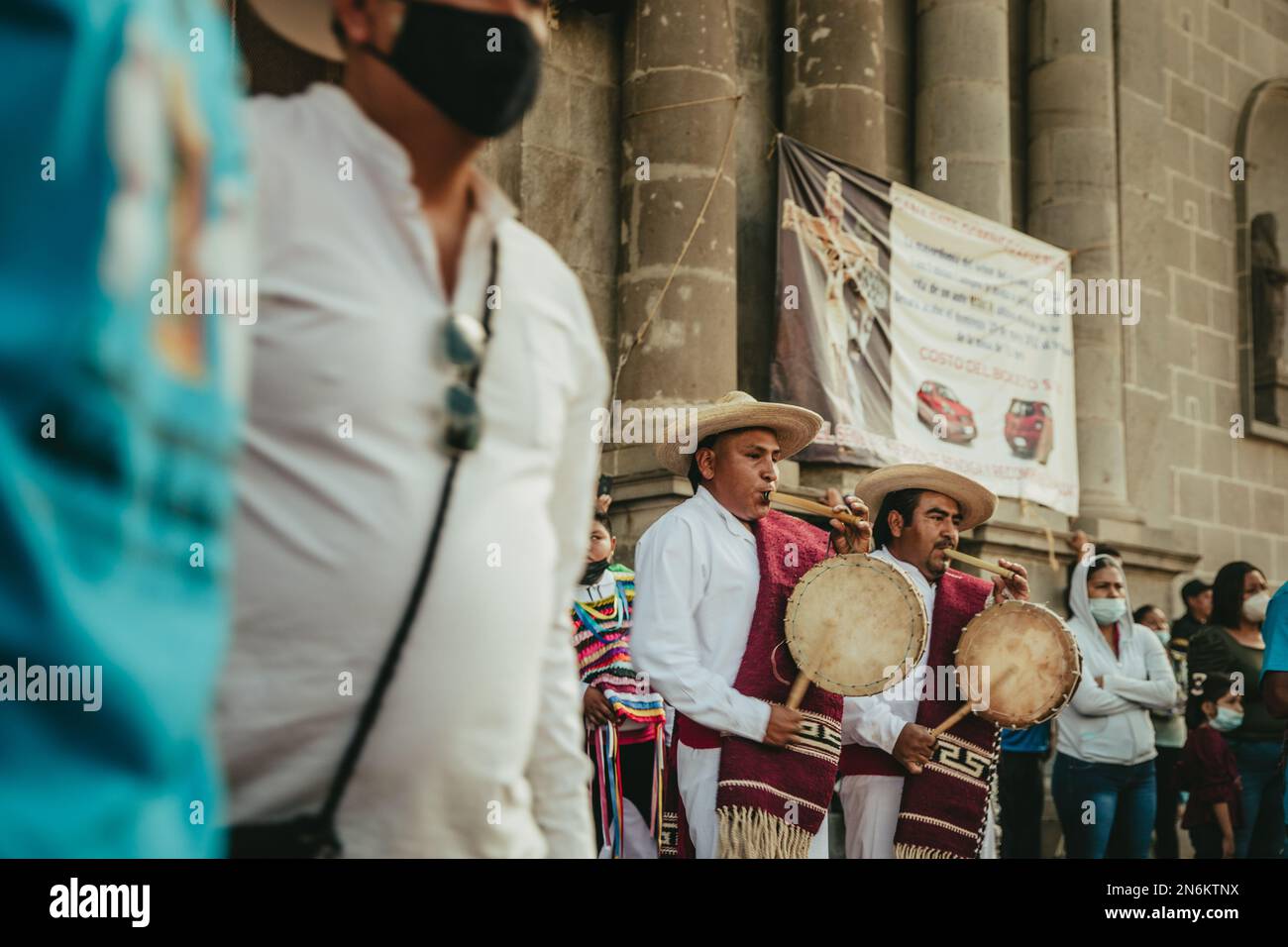 Traditional Mexicans performing drums and celebrating Saint Sebastian