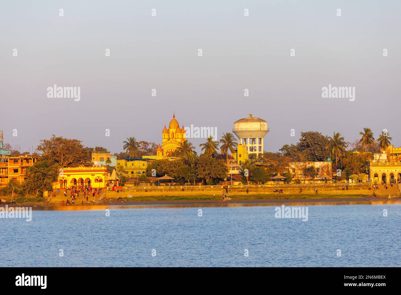 View of Dakshineswar Kali Temple and Dakshineswar Temple Bakultala Ghat on the banks of Hooghly River, Calcutta, West Bengal, India in evening light Stock Photo