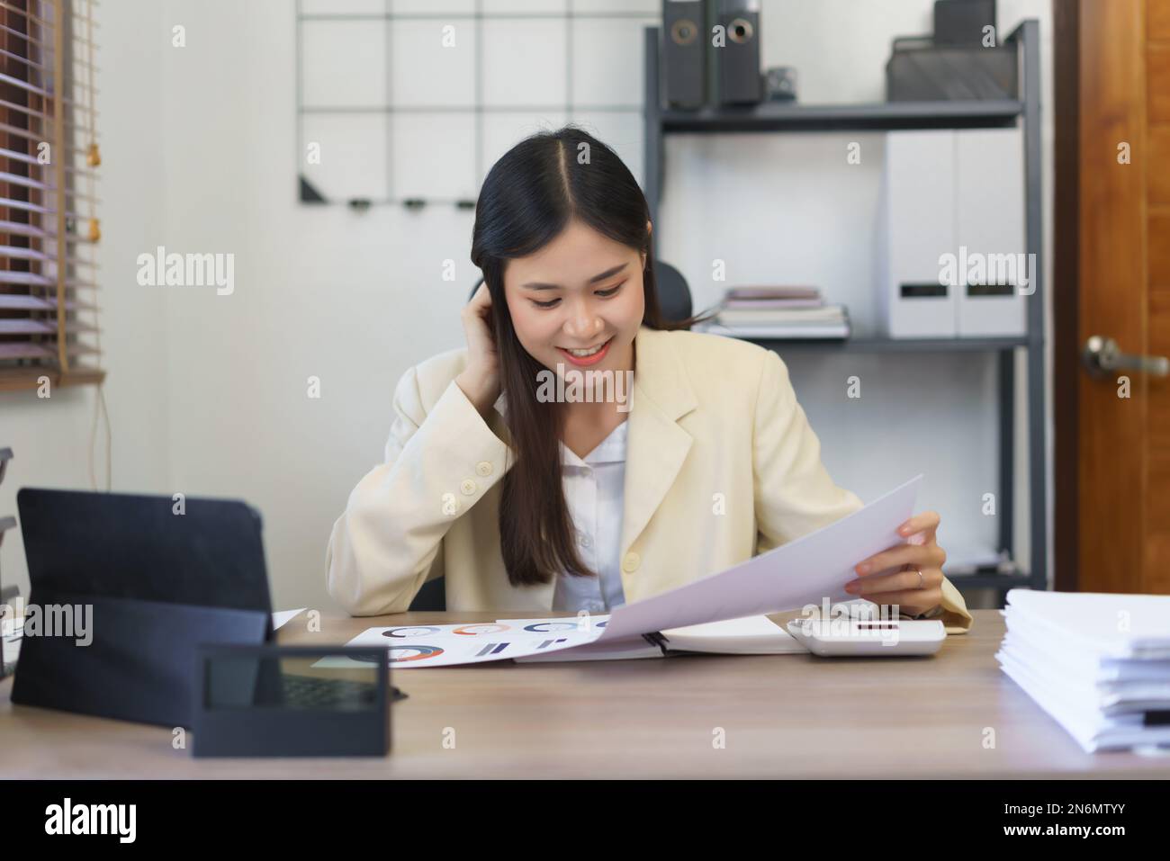 Secretary Reading Work of secretary concept, Female secretary thoughtful while reading ...