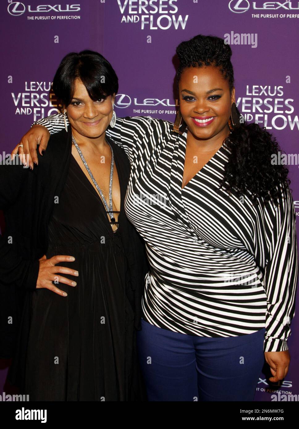 Walton isaacson executive ayiko broyard and singer jill scott arrive at