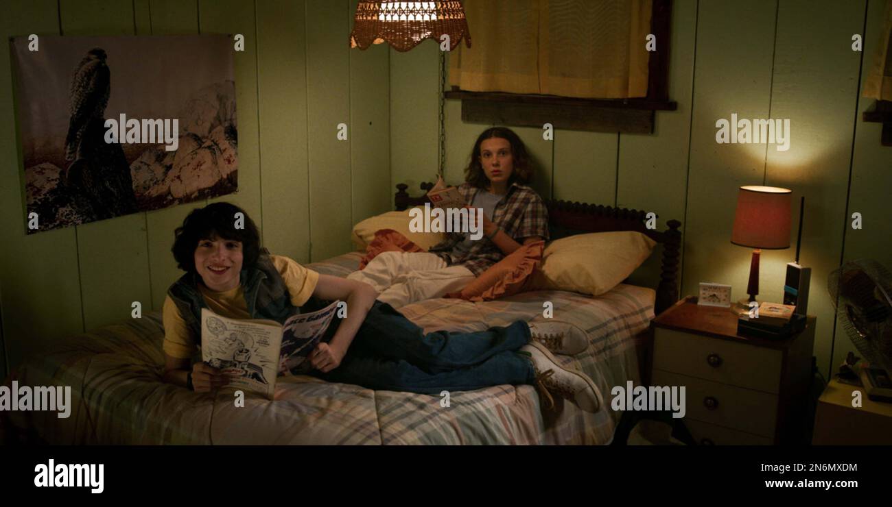 STRANGER THINGS (TV)  FINN WOLFHARD  MILLIE BOBBY BROWN  NETFLIX/MOVIESTORE COLLECTION Stock Photo