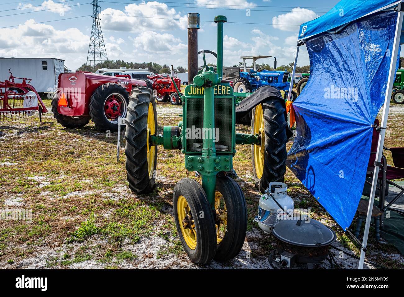 A 1937 John Deere Model A tractor with cultivators attached Stock
