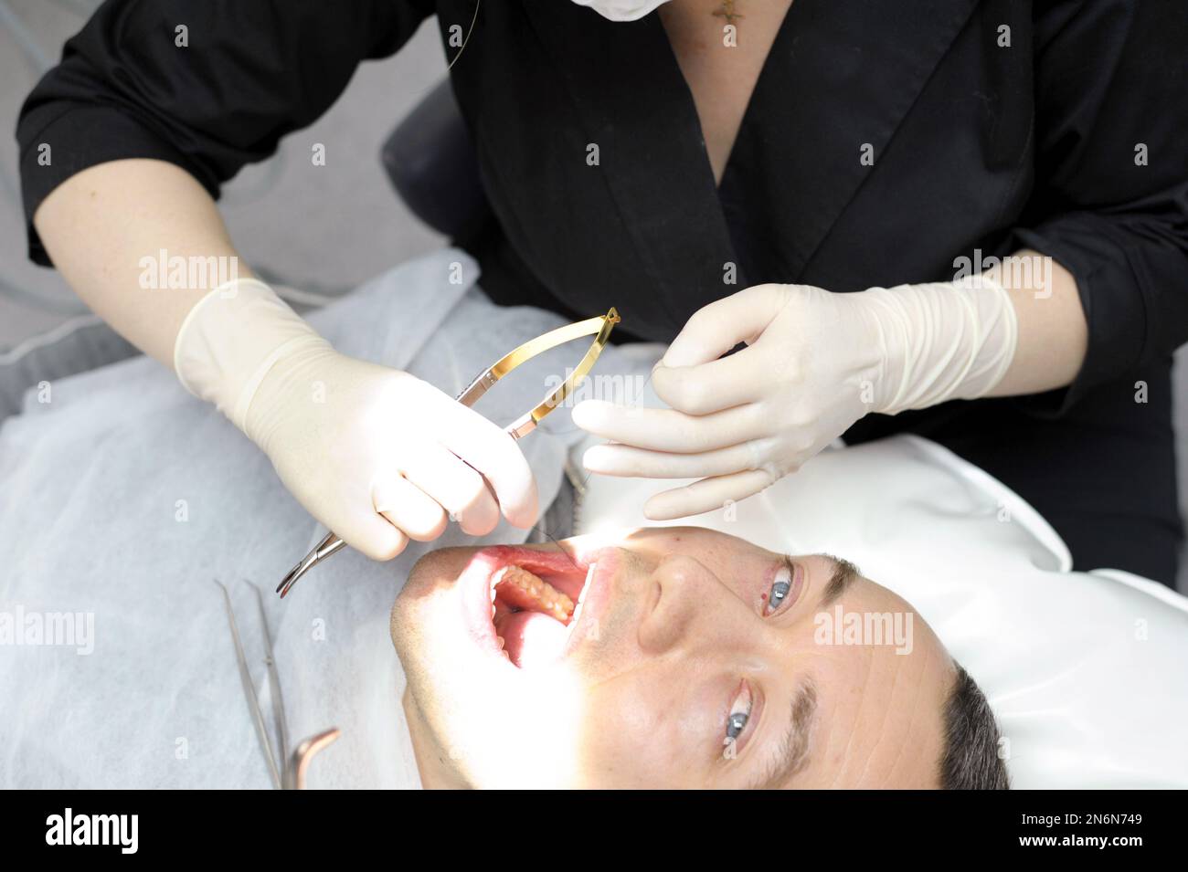 It hurts him anesthesia dental treatment hires stock photography and